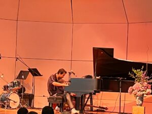 Guy Mintus at the piano for the children's concert at the Abbey Bach Festival 2024